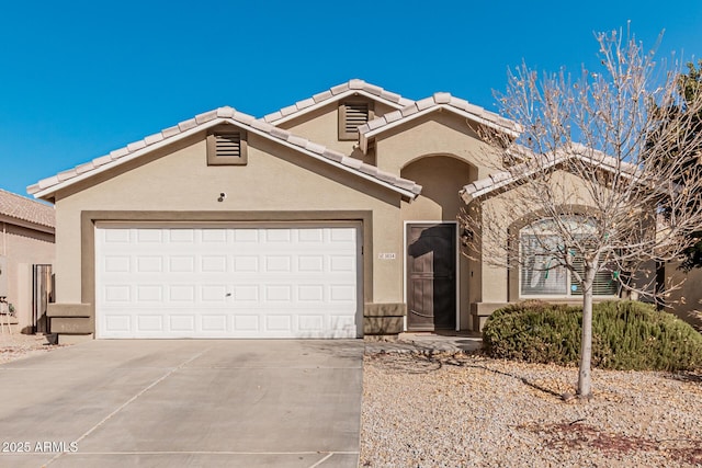 view of front of home with a garage