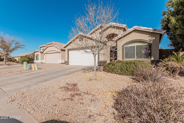 view of front of property with a garage