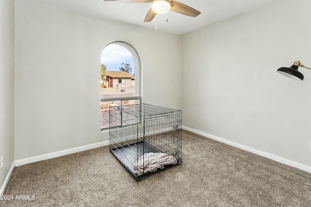 carpeted bedroom featuring ceiling fan