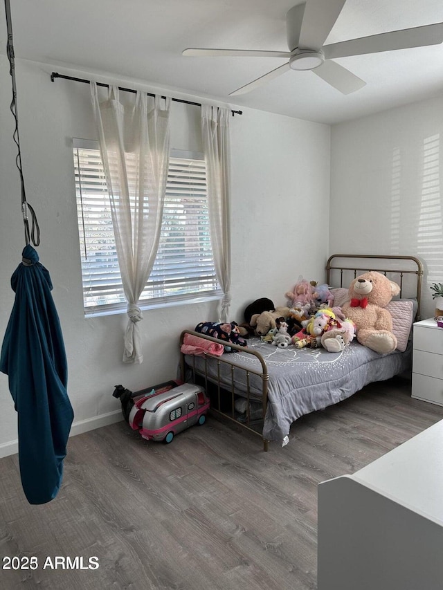 112 W Vogel Ave, Phoenix, AZ 85021 - bedroom with wood finished floors, a ceiling fan, and baseboards