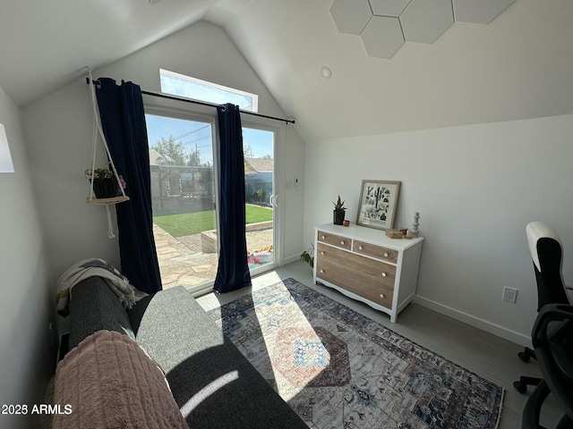 112 W Vogel Ave, Phoenix, AZ 85021 - bedroom featuring access to outside, vaulted ceiling, wood finished floors, and baseboards
