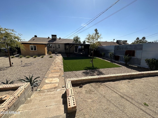 112 W Vogel Ave, Phoenix, AZ 85021 - rear view of property with a yard and a patio area