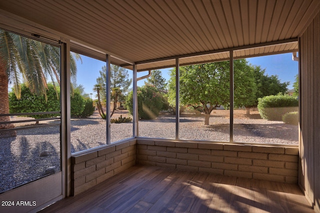 unfurnished sunroom with a wealth of natural light