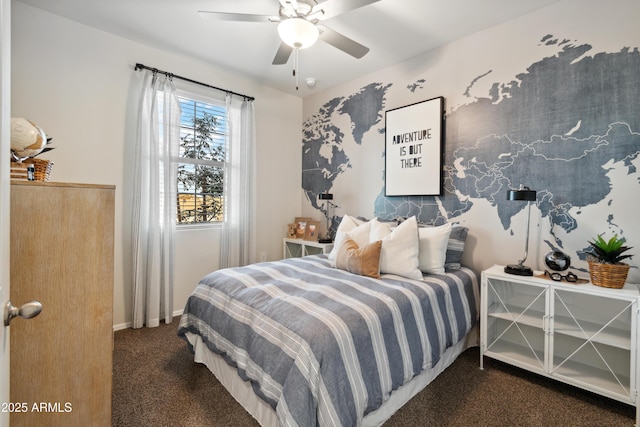 bedroom featuring dark colored carpet, ceiling fan, and baseboards