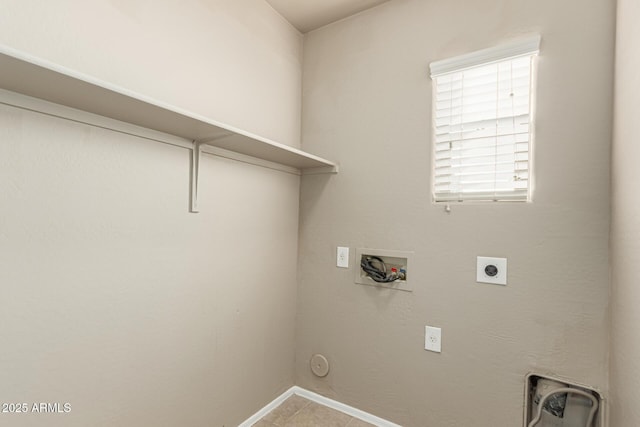laundry area featuring laundry area, tile patterned flooring, baseboards, hookup for a washing machine, and hookup for an electric dryer