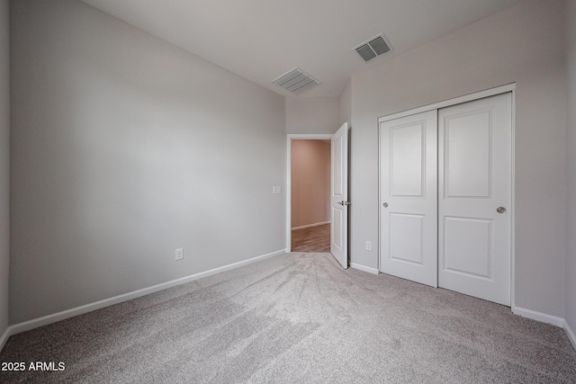 2514 E Music Mountain Ave, Apache Junction, AZ 85119 - unfurnished bedroom featuring carpet, baseboards, and a closet