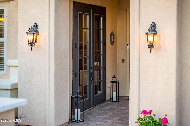 doorway to property featuring french doors