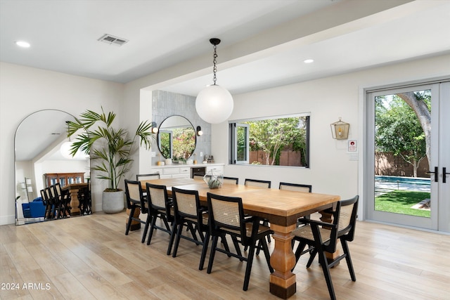 dining space featuring recessed lighting, visible vents, and light wood-style flooring