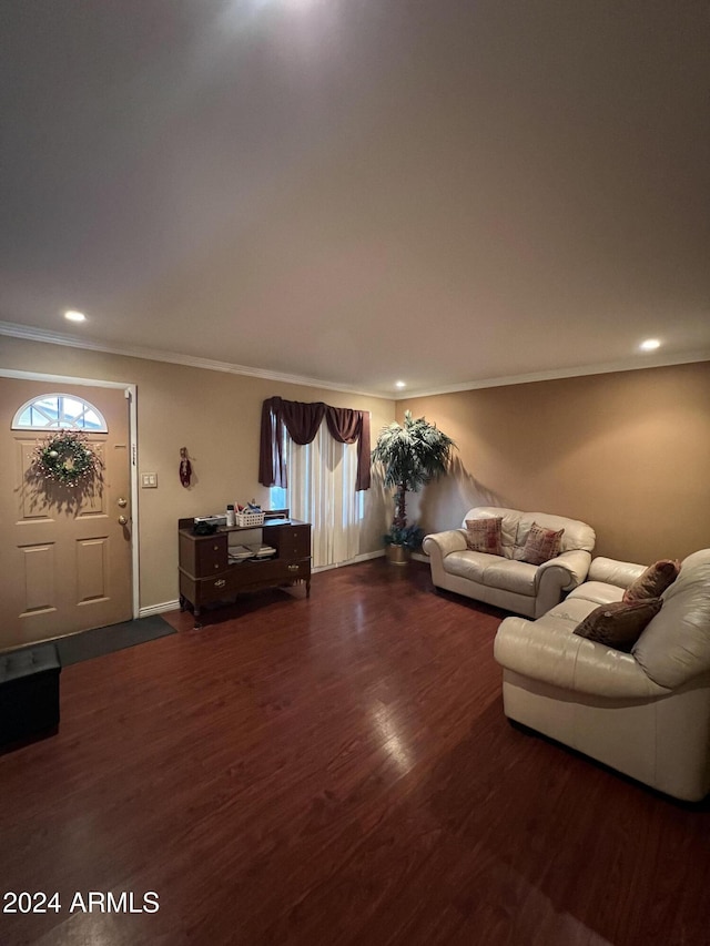 living room with ornamental molding and dark wood-type flooring