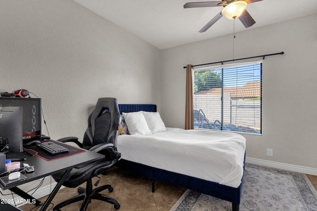 bedroom with vaulted ceiling and ceiling fan