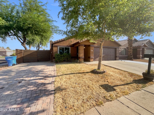 single story home with a garage