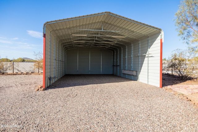 garage featuring a carport