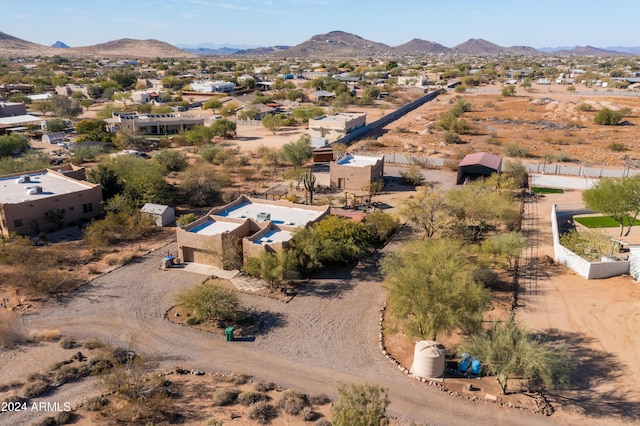 drone / aerial view featuring a mountain view