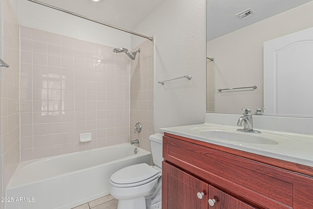 full bathroom with visible vents, tile patterned floors, vanity, toilet, and shower / bathtub combination