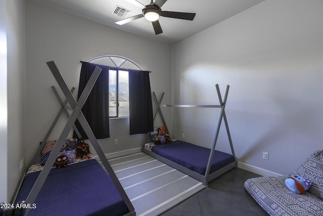 unfurnished bedroom featuring ceiling fan