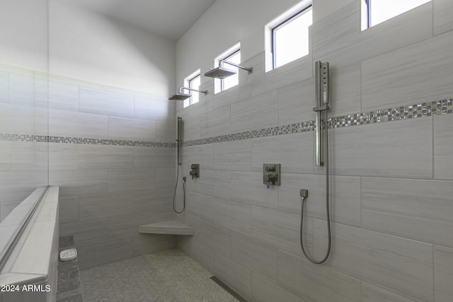 bathroom with tiled shower