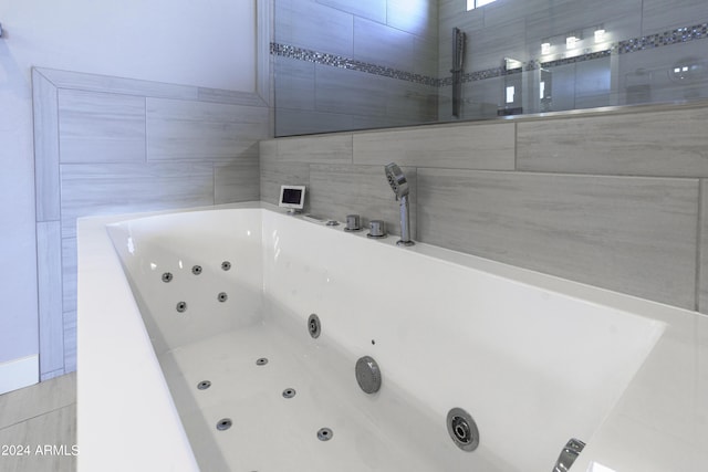 bathroom with a bathing tub