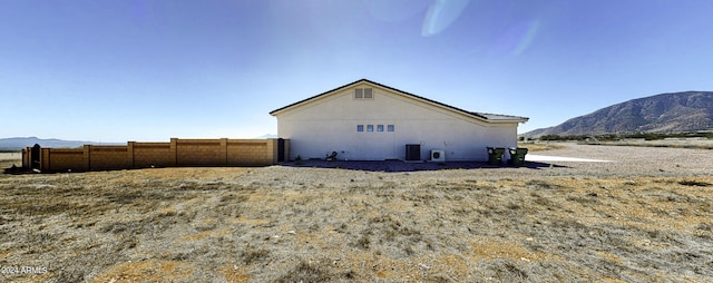 view of home's exterior with a mountain view