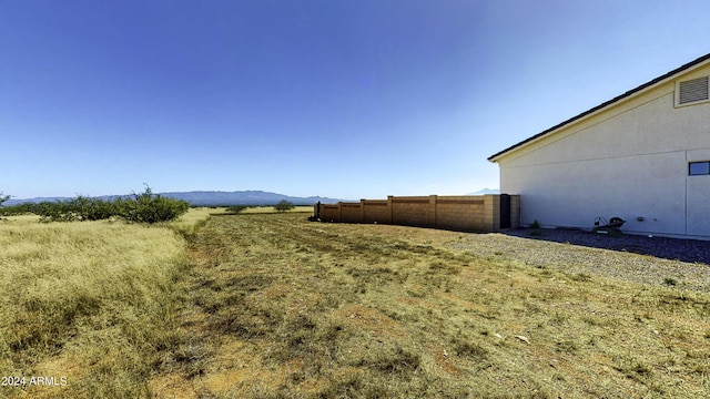 view of yard with a mountain view