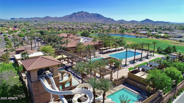 bird's eye view featuring a residential view and a water and mountain view