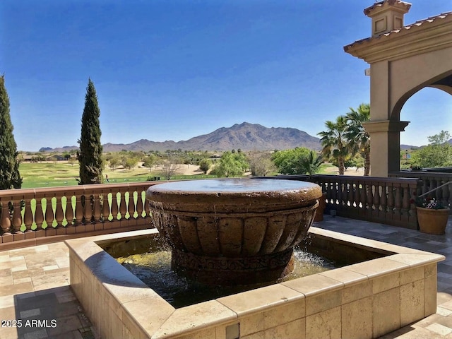 view of patio featuring a mountain view