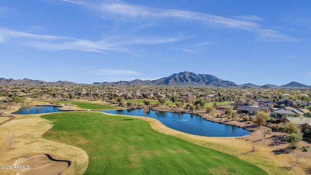 view of property's community with a swimming pool, a residential view, and a water and mountain view