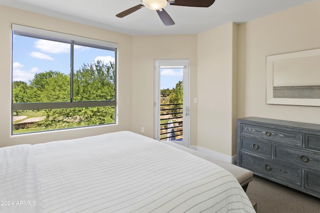 bedroom with ceiling fan and access to exterior