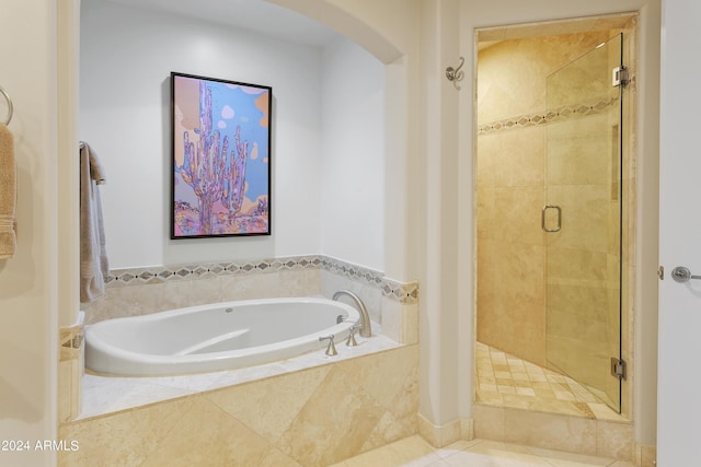 bathroom with tile patterned floors and plus walk in shower