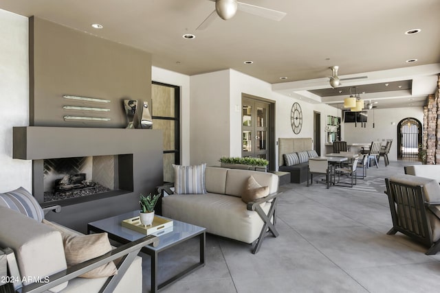 living room featuring ceiling fan