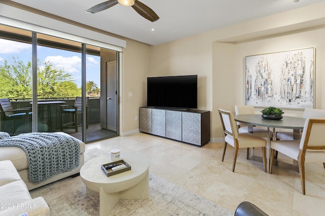 living room with light tile patterned floors and ceiling fan