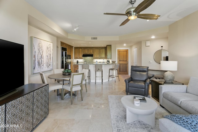 living room featuring ceiling fan