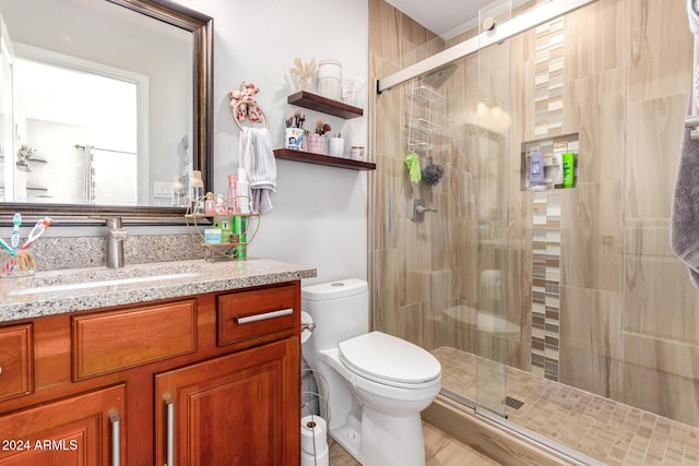 907 E 9th Ave, Mesa, AZ 85204 - bathroom featuring vanity, toilet, and a shower stall