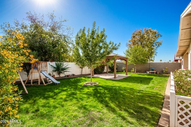 907 E 9th Ave, Mesa, AZ 85204 - view of yard featuring a playground, a gazebo, and a patio