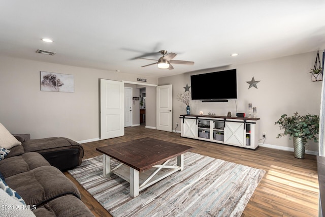 907 E 9th Ave, Mesa, AZ 85204 - living room featuring a ceiling fan, baseboards, wood finished floors, and recessed lighting