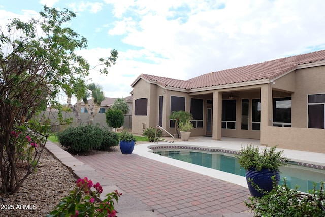 view of pool featuring a patio area and a fenced in pool