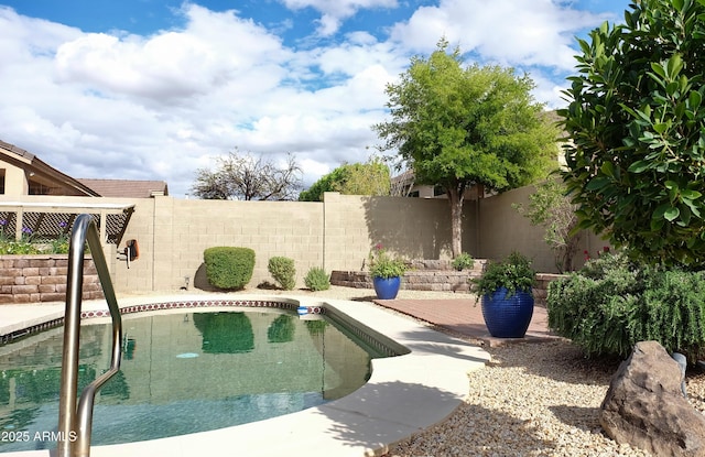 view of pool with a fenced backyard and a fenced in pool