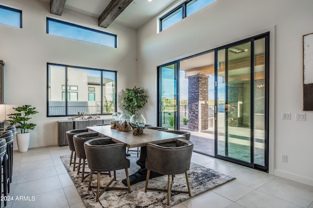 34749 N 83rd Way, Scottsdale, AZ 85266 - dining space featuring beam ceiling, light tile floors, and a high ceiling