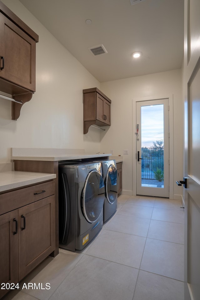 34749 N 83rd Way, Scottsdale, AZ 85266 - laundry area featuring cabinets, washer and dryer, and light tile floors