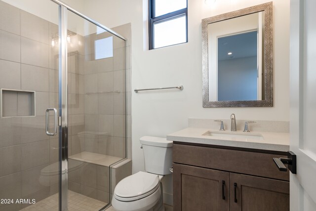 34749 N 83rd Way, Scottsdale, AZ 85266 - bathroom featuring oversized vanity, toilet, and a shower with door