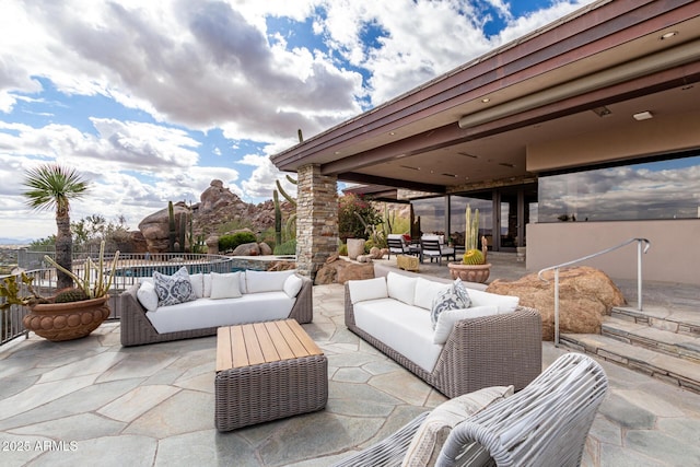 view of patio with outdoor dining area and outdoor lounge area