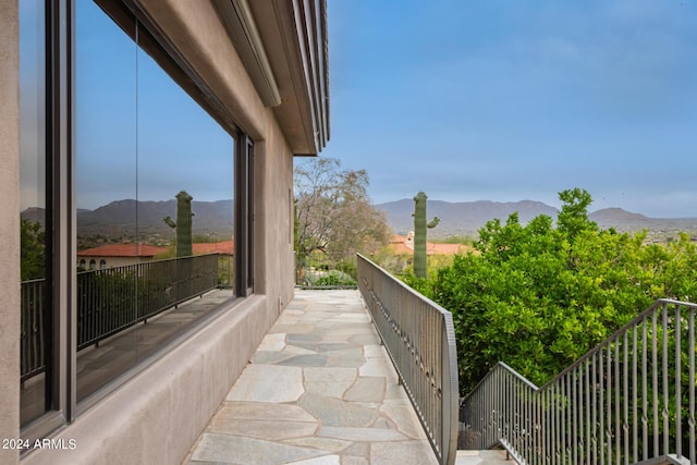 balcony featuring a mountain view