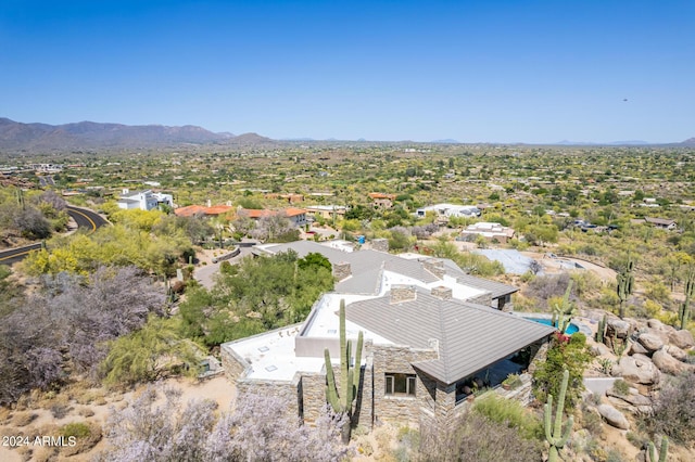 birds eye view of property featuring a mountain view