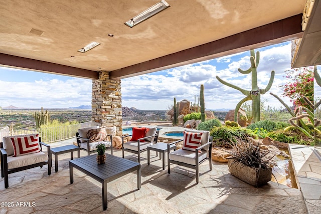 view of patio / terrace with an outdoor pool and an outdoor hangout area