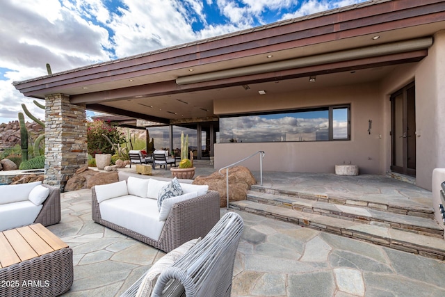 view of patio / terrace featuring outdoor dining space and outdoor lounge area