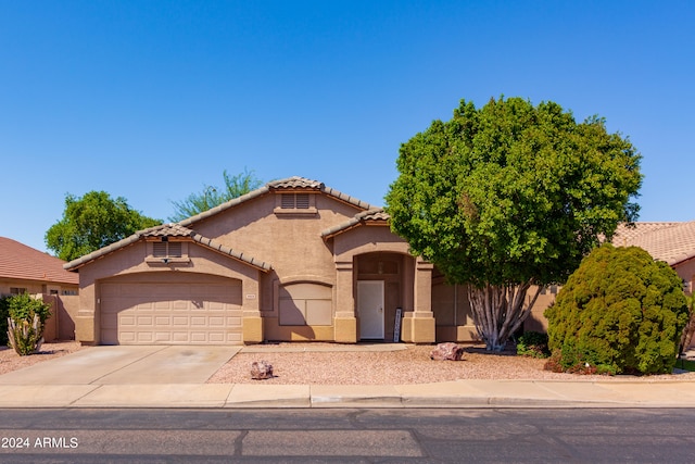 view of front of property featuring a garage