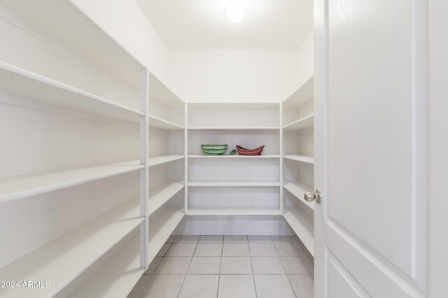 unfurnished room featuring hardwood / wood-style floors, high vaulted ceiling, and ceiling fan