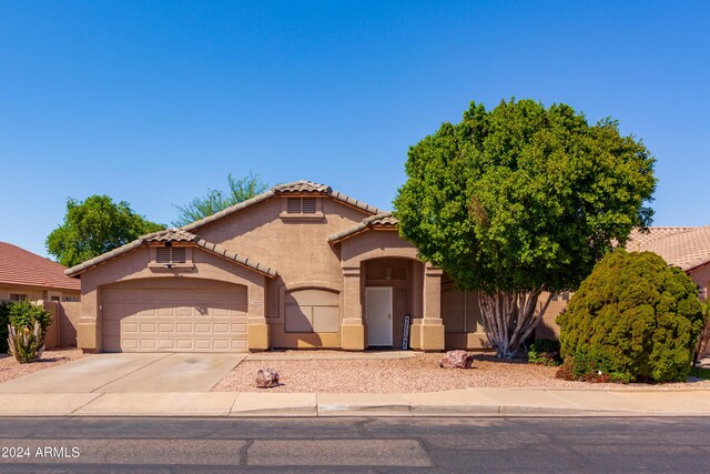 rear view of house with a patio area and central AC unit