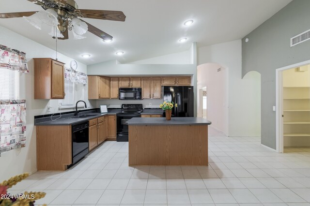 entrance foyer with light hardwood / wood-style flooring, lofted ceiling, and ceiling fan