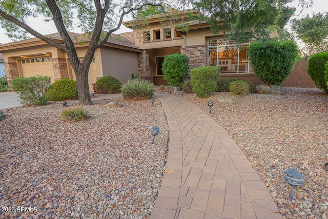 view of front of home with a garage