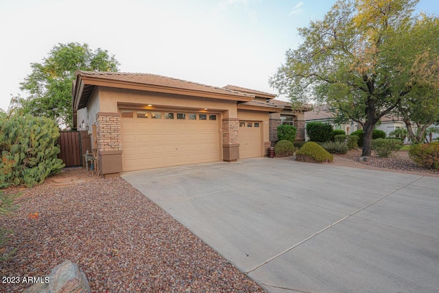 prairie-style home featuring a garage